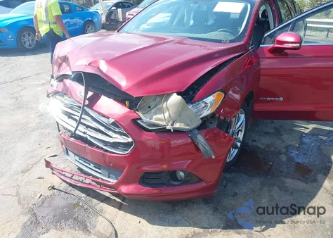 2015 Ford Fusion Hybrid Titanium z USA, uszkodzony, nr VIN 3FA6P0RU3FR300495